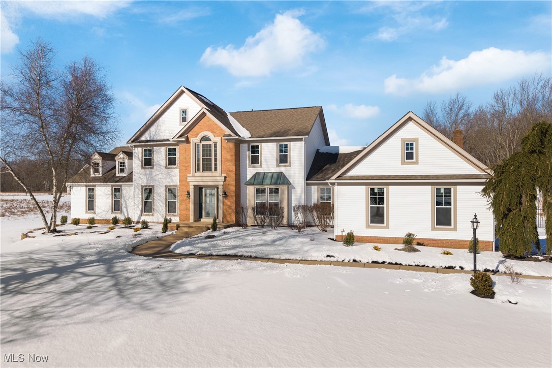 Discover this stately colonial, nestled on over four sprawling acres, in Green Schools! Enjoy the peacefulness of the land with breathtaking views of the peaceful pond and daily deer visitors.
This spacious home offers a blend of elegance and functionality, starting with a first-floor office featuring built-ins, a bright formal living room, and an elegant formal dining room with a bay window and tray ceiling.
Prepare culinary delights in the gourmet kitchen, boasting extensive cabinetry, a center island/breakfast bar, ample counter-space, and a large dining area, flowing seamlessly into the great room with soaring ceilings and a cozy fireplace.
The first floor also includes two bedrooms, a full bathroom, two laundry rooms, and a half bathroom for added convenience. The bedroom set up with the private bathroom and laundry room would work well for an in-law or teen suite!
Upstairs, retreat to the primary bedroom which features an ensuite bathroom with a large jetted tub, separate shower, and a walk-in closet. You’ll find three additional bedrooms and a full bath, providing plenty of space for all!
The partially finished basement offers endless potential for recreational activities or storage.
Get some fresh air on the huge deck which has a fun bridge leading to a covered deck area as well – overlooking the fenced in yard! Enjoy serene pond views, or some fun ice-skating in the winter, in the front yard gazebo!
For car enthusiasts or those needing extra storage, this home features both an attached 2-car garage and a detached 3-car garage with a bonus room and half bath!
A few of the many updates include the windows ('24), siding ('24), A/C ('21 & '24), roof ('23), well pump ('22), water softener ('24), decking ('24), and so much more!
Don’t miss this rare opportunity to own a beautiful property with ample space, thoughtful design, and luxurious features. Schedule your private showing today!