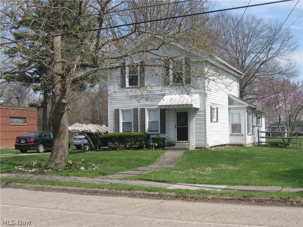 Wonderfully spacious home with 4 bedrooms and 2 full baths. Deck off the kitchen provides a great place for a family get together or just enjoying a summer evening after work. Also a roomy family area perfect for entertaining. Refrigerator and stove stay along with washer and dryer. New hot water tank. Large back yard with utility shed. Roof replaced apprx 2016. Home also has had newer plumbing installed. Great location between Youngstown and Cleveland and close to community stores and high school.
