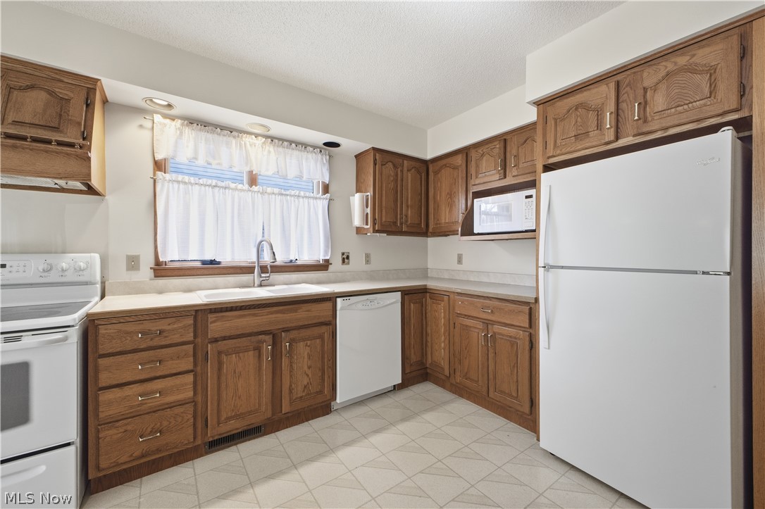 Hilltop Corner Condos - Residential