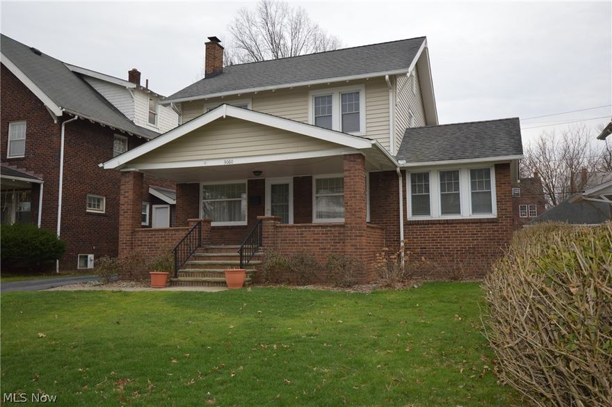 Beautiful, updated Colonial with loads of charm! Expansive front porch welcomes you into this well maintained home. Hardwood floors, white baseboards and neutral paint show off the updates yet the arched doorways and built-ins keep the charm of this home. Kitchen boasts granite countertops and stainless steel appliances. Private dining room with updated light fixture and plenty of room for entertaining. Large living room with built-ins. Beautiful sunroom with several windows to let in plenty of natural light which is a great space to relax or to use as an office. Convenient first floor half bath. Three nice size bedrooms on the second floor with full bath. Upstairs balcony. Walk-up attic offers plenty of extra storage. Unfinished basement with laundry area has room for storage, workshop/hobby room or can be finished for additional living space. Many possibilities! Two car detached garage. Nice size backyard. Central air. Many updates to this home include: new rubber roof on porch in 20