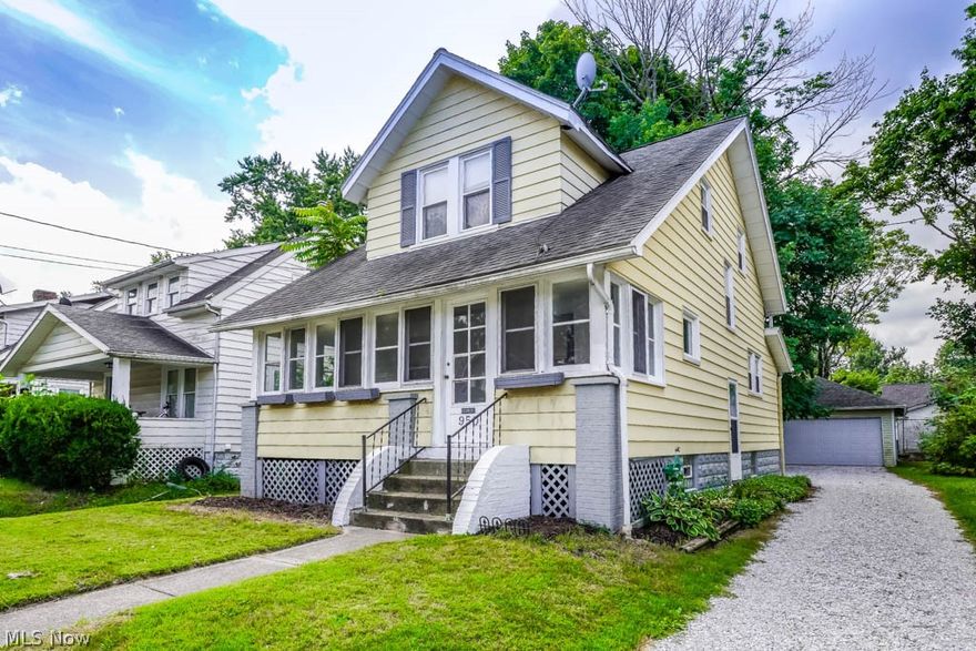 Affordable Cape Cod with century home charm! Perfect for a first home or investment, this cozy layout features a living room with a fireplace and built-in bookcases, a dining room with a wide window sill perfect for plants, and wide trim molding, and a modern kitchen with a charming corner display cabinet. Upstairs, you'll find two bedrooms and an updated full bath with a tub/shower combo. Relax in the enclosed sun porch or enjoy summer on the spacious back deck overlooking the backyard and detached two car garage. Call to see this move-in ready Akron gem today!