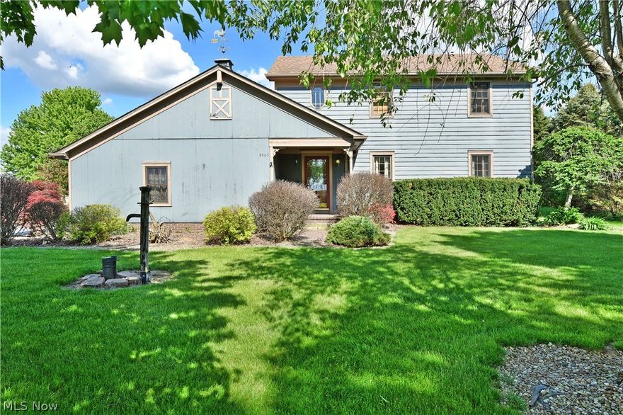 Location! Location! Location!Welcome HOME to this beautiful 3 Bedroom, 2 1/2 bath Colonial situated on over an acre in Canfield! Custom built and OUTSTANDING quality by Direnzo. Beautiful paver patio with a private backyard. Wide wood plank floors throughout. Three generous size Bedroom’s with a Master Suite. Full basement with partially finished Rec Room. A gem to truly make your own.