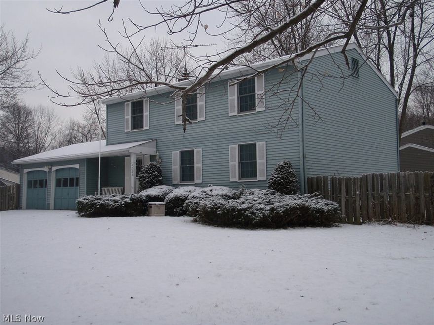 Spacious Colonial with Inground Pool.  White wash oak cabinets in large Eat In Kitchen.  Master Bedroom with Bath and full wall of Closets.  New carpet throughout (2015), Windows (2000) & Water Heater (2006).  Covered Deck overlooks Inground Pool.  2 Car Attached Garage.  Most rooms freshly painted.  Family Room with fireplace.  Fenced Back Yard.