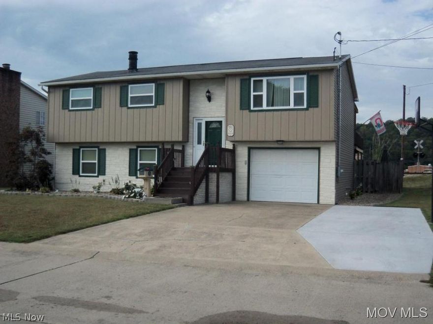 What a cheerful home! Lots to love here Nice big backyard with privacy fence, patio area, small pond, stone fire pit.Huge partially covered deck off dining area.Loads of room inside for the kids and toys!  Elem: Belpre Elementary School  Elem/Bus: N  JrHigh: Belpre Middle School  JrHigh/Bus: N  High: Belpre High School  High/Bus: N  Fire: VOL  Police: CTY  PossFreeGas: N  ;SQFT=Fin L1:1188, Fin Bsmt:500, Fin Above:1188, Fin Total:1688, Unfin Bsmt:618, Unfin Above:618;GAR= 1 Car Built In;PRKG= Parking Pad
