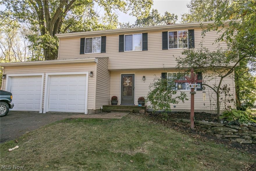 Family sized - quiet area! Welcome to Guise Park in Munroe Falls. Updated kitchen featuring newer counter tops, flooring and beautiful back splash. Newer stove and dishwasher. Updated garage doors, slider to oversize rear yard deck, and newer carpet on first floor. Enjoy the wooded rear yard, beautiful deck overlooking yard. Near park, shopping and conv. to highway. Updates incl. newer roof and siding in 17. Motivated!!