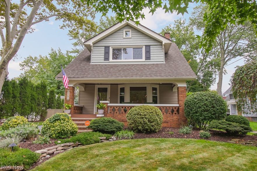 Upon entering this home, you will realize it's spectacular updates for today's modern living while beautifully maintaining its 1925 character and charm.  All hardwood floors throughout coordinate with a pleasing paint palette.  The updated Kitchen is a cook's dream with plenty of counter space and an abundance of cabinets. A sliding glass door leads to 2 composite decks.  The traditional Dining Room includes beautiful built-ins framing a large window.  The Living Room features a Fireplace flanked by glass cabinets and a bay window adorned with electric blinds. Upstairs you will find 3 large Bedrooms and an updated full Bath with Jacuzzi tub.  The large master Bedroom includes a built-in wardrobe wall as well as a closet. The lower level includes a finished Rec Room complete with wet bar adorned with reclaimed antique Japanese boat wood and includes a sink, kegerator and additional refrigerator.  The entry walls and media area feature travertine marble accents.  This level also houses t