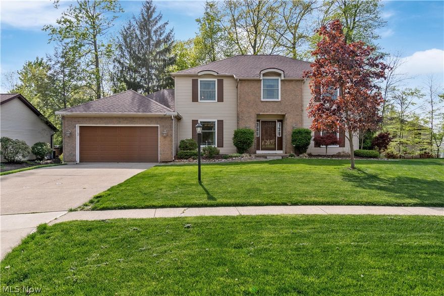 Welcome Home to 17656 Fairfax Lane, a must see 4 bedroom Colonial nestled on a cul-de-sac in Strongsville's sought after High Point community! The lush landscaped yard boasts attractive curb appeal. This home showcases many move in ready improvements, including: a beautifully remodeled kitchen, laundry room & 1/2 bath(2019), updated LVT flooring found throughout the kitchen, living room, dining room & foyer(2019), recessed lighting in the kitchen & family room(2019), & all new Anderson windows(2021) w/ transferable warranty. The inviting foyer is flanked by a delightful formal dining room & lovely formal living room. The family room is spacious & provides a cozy brick fireplace & new slider doors that take you to the large deck overlooking the treelined, park-like backyard. Back inside, you are sure to fall in love w/ the updated & modern eat-in kitchen complete w/ white cabinetry, granite counters, sprawling center island, dining area & beautiful backsplash. A private office, updated