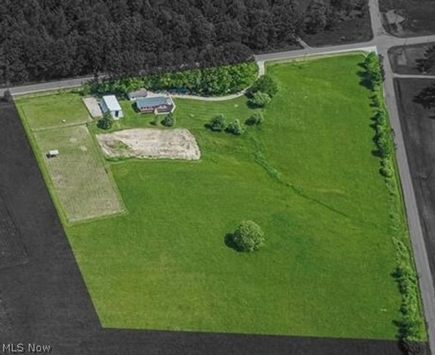 8 Acre Hillside Farmette featuring an updated and immaculate 4 bedroom raised ranch with a 30x40 barn with 3 stalls, pasture with new fencing and hayfields!  Also a beautiful concrete winding driveway and 2+ car detached garage with a separate workshop and office area.  Located on the main level is the kitchen, dining, living room with pellet stove, master bedroom with bath and bedrooms 2 & 3 with main bath in hallway.  The lower level offers the 4th bedroom as well as a 23x22 family room, laundry/utility room and large storage closet. This home rests at the top of a hill and offers beautiful views of rolling fields and a treeline.  Located within 10 miles of beautiful Lake Erie, wineries, restaurants and just 3.5 miles from the Kingsville exit off Rt 90 and just 5.5 miles from the Conneaut exit off Rt 90 in Monroe Twp, (no zoning)!! The home is move in ready, recent improvements include new shingles, baseboard heaters, light fixtures, outlets and switches, toilet in master bath, pelle