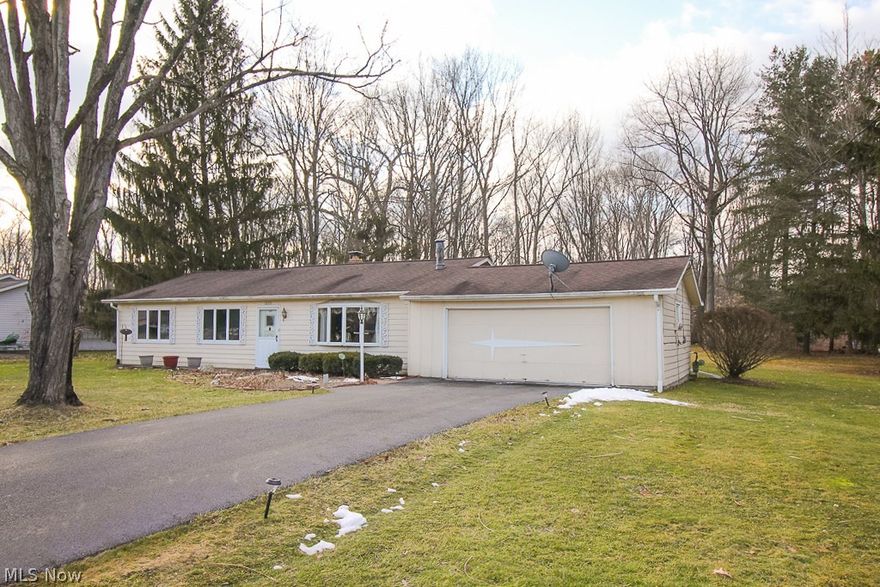 Wonderful opportunity to make this spacious 3 bedroom, 2 full bath ranch your own. The cozy family room with a wood-burning fireplace looks out through Andersen windows over the private wooded lot, as does the 26’ long master bedroom! The living room has a charming gas fireplace. Enjoy the privacy of your home office located just off of the garage. Bring your decorating ideas and add value to this solid ranch home. Home is being sold “as is.” Seller will make no repairs.