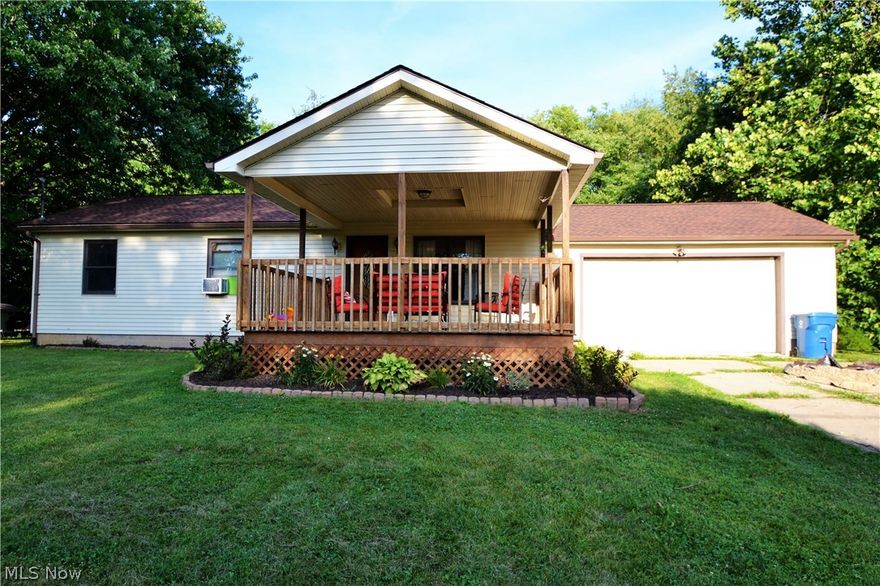 Lovingly cared for this 3 bedroom home comes with 2 lots and woods to the rear. As you arrive at the home you will be greeted by a gated front deck perfect for summer evenings. Many updates are found in this home all done in the past few years. Newer laminate floors and large spacious eat-in kitchen. Kitchen provides access to the rear deck and large yard. Full basement and lower level full bath redone in July 2016.