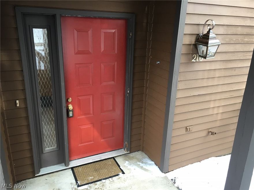 Enjoy worry-free living with fantastic views near the country club. This lower-level condo features convenient one-floor living and private master suite with a sliding glass door to the back patio. Recent updates include fresh paint throughout ('15), newer carpet in both bedrooms ('16), newer shower doors in both bathrooms ('16) and newer gas water tank ('16). This home has one parking spot at the front door, and also one spot in the shared garage. The garage features an electric opener and a private secured storage room.