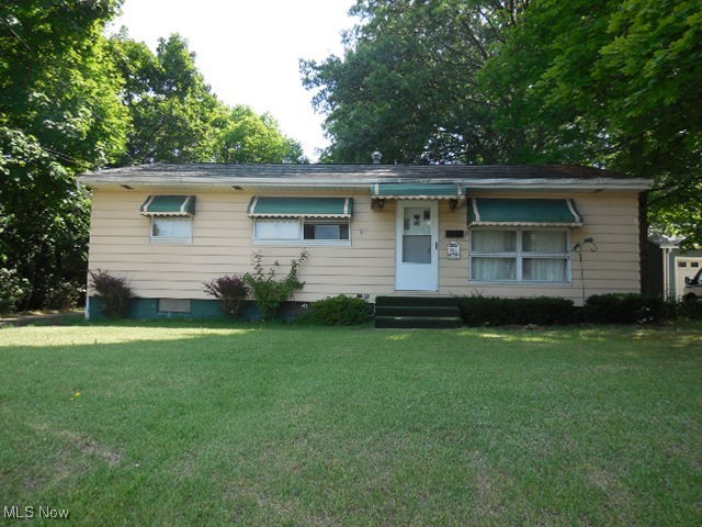 opportunity is knocking with this sensibly priced Ranch style home. There has always been carpet covering the hardwood floors. Use your imagination to update the nice sized Eat-in kitchen. The master bedroom offers a triple size closet and bedrooms two and three have double closets. The possibilities of the extra room in the basement are numerous. Enjoy the nice spacious backyard, which offers a wheelchair accessible ramp to the deck. Appliances are a gift to the buyer, however, are not guaranteed. THIS HOME IS BEING SOLD AS-IS! Sellers will not make any repairs.