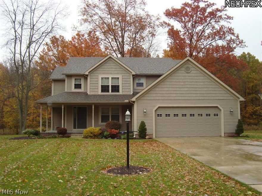 Welcome home to 1021 Norton Drive! This well maintained custom built 2006 Colonial has much to offer. With over 2800 sq. ft. of living space and plenty of storage, neutral decor, oak trim throughout, it's fresh, clean and ready to move in! There's 4 spacious bedrooms and 2 bathrooms upstairs. The huge master bedroom offers a separate shower, jacuzzi tub, double sink and large walk-in closet with custom cabinets. Added features of this home include: beautiful oak cabinetry in the eat-in kitchen (appliances included), granite island countertop, ceramic flooring, large first floor laundry and half bath. Formal dining room with crown molding and a built in oak china cabinet. Upgrades include a security system, central vacuum system, energy efficient pellet burner, whole house fan, oversize garage with hot/cold water. You will enjoy the outside with its peaceful park like setting that backs up to the woods. Call for your private showing today!