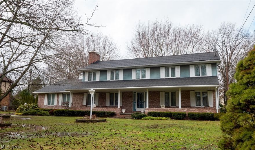 Come see this one-of-a-kind, custom built, single owner home on a large lot with an oversized 3-car garage in Plain LSD.  On the main floor you will find a "homey" living room with an ENTIRE WALL of brick surrounding the fireplace and fresh new, neutral carpet.  Main level also has laundry room, half bath, large formal living room, dining room and open-concept eat-in kitchen.  Step through the double doors into the open and airy 3-season sunroom overlooking the large backyard with windows and sunshine galore.  Upstairs you will find a large master suite with full bathroom and 9x9 walk-in closet, 4 generously sized bedrooms and another full bathroom.  The basement has a large rec-room with bar, dimming lights, and plenty of room for entertaining.  Ohio State Waterproofing completed in 2012 with lifetime, transferrable warranty.  Unique character and charm is found throughout this home with crown molding, wooden beams - ALL wallpaper has been removed with fresh, neutral paint throughout.