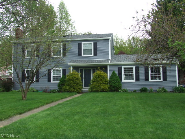 Great 4BR/2.5BA Colonial with huge eat-in Kitchen with oak cupboards, formal Dining room with doggy door and sliders to deck, large fireplaced Living room, and fantastic Great room with cathedral ceiling, skylights and another set of doors to deck. Extras include master bath, whole house fan, attached 2-car garage with h/c water, composite deck off the great room. Updates in last 10 years include siding, roof, H2O (1 yr), furnace (8 yrs), deck, winds (9? yrs). New main bath surround and closet doors. Finished basement has 2 sections for possible bedroom or office and rec room. Corner lot. Home Warranty. Make this your new HOME!