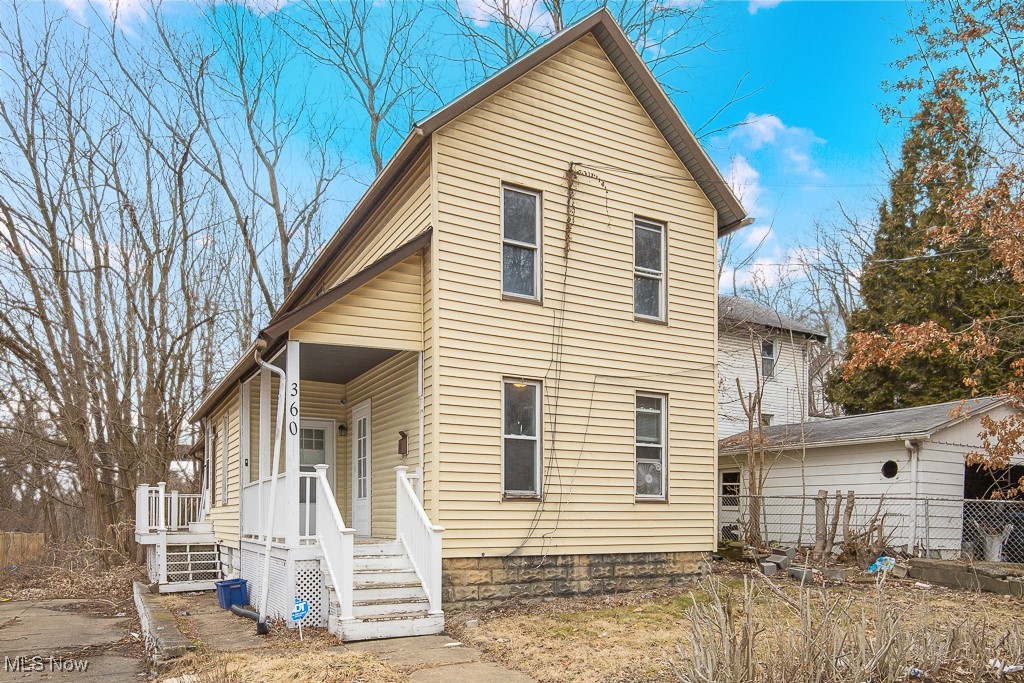 Adorable and Updated Home located in North Akron! This property has two bedrooms and two full baths and is ideal as a starter home or as an investment property with many updates throughout! The kitchen, carpet, chimney and bathrooms were completely renovated in 2022, while the painting and plumbing were updated in 2021, Roof, Furnace and windows were all replaced in 2017.
