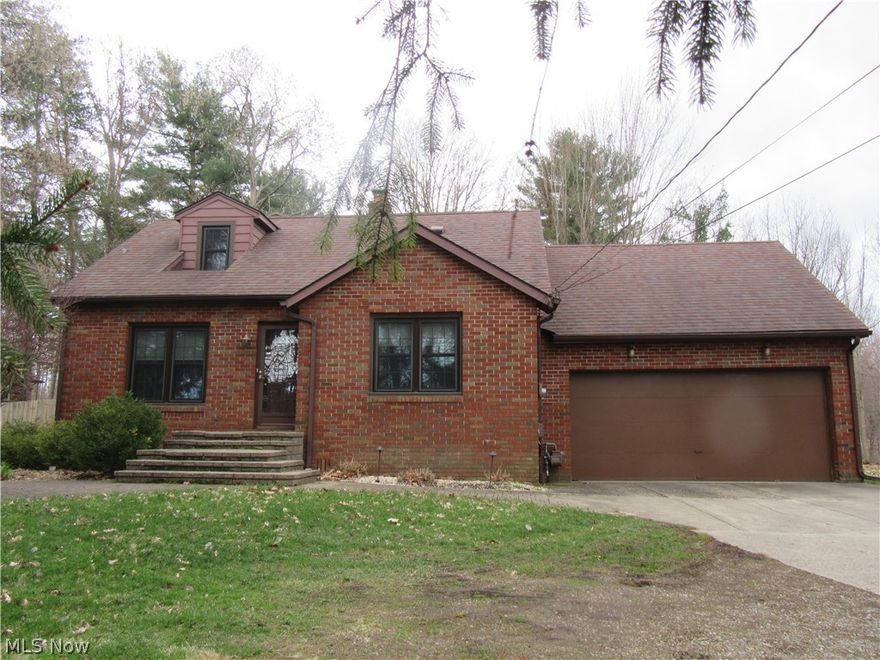 Lovely all brick cape cod situated on over an acre of land.  House it situated way back from road so it offers an abundance of privacy, cannot be seen from road. Refinished hardwood floors throughout home.  All windows have been replaced.  Formal dining room.  The full bath and half bath upstairs have both been remodeled with wood vanities and vessel sinks.   Lovely tile around tub.  All appliances remain, including washer and dryer in basement.  Seller had plans drawn up for kitchen remodel which can be shared.  Upstairs has pine flooring, 2 bedrooms (one is being used as a closet) and a bonus room or office area.  Basement has finished rec room, updated electric box and glass block windows.  There is a toilet and sink in basement with a shower in a separate room with shelving.  Two car att garage.  Wooded backyard with patio, firepit and shed. One side of yard has almost new wood fencing.  Must See!