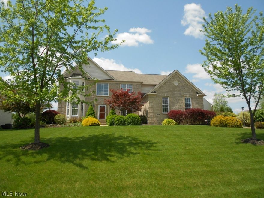 Outstanding four bedroom, four & a half bath colonial in The Kingsbury Reserve.  Enter the inviting two story foyer & be amazed at the beauty of this home!  The formal living room & dining room feature crown molding & new hardwood floors (3/2014).  A two story family room is accented by a wall of windows & a double sided fireplace that also warms the private 1st floor office.  The gorgeous kitchen offers granite countertops, custom cabinets & breakfast bar.  Dinette area opens to the all season sun room with marble floor plus sliders to deck, patio & incredible views of the pond.  Upstairs you'll find a fantastic master retreat with vaulted ceiling & bath with Jacuzzi, walk-in shower, double sinks, & walk-in closet.  Three additional bedrooms on 2nd floor, one with private bath.  All baths feature marble flooring.  The amazing lower level offers a bonus room, full bath, wet bar, game area, & craft area.  The Kingsbury Recreation Center includes swimming, tennis, clubhouse, & pond!