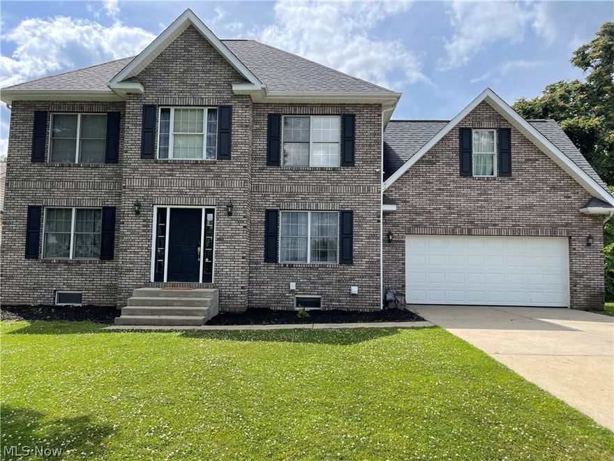 This traditional double story is perfect for entertaining inside or outside. Beautiful and stately and it has a majestic feel right away when you pull into the driveway. Mature trees, fencing in the back and down most of the sides. A beautiful entertaining area with a Hugh deck for the party! Sliding doors will take you into a very spacious lovely kitchen, dining room combination. A great room or formal room and yet even another room that could be an office. YES Plenty of space! The fantastic staircase leads you up to the large owner's suite with an attached bath, a luxury bath with a Huge tub, double vanity, shower and larger walk-in closet. Down the hallway you have another full bath, with double vanity, tub and shower and three more bedrooms! The walk in attic space is now finished and makes a very large room that could be many different things. Now used as one of the bedrooms. Going down from the kitchen you will have a very large rec room or exercise room or man cave! There is als