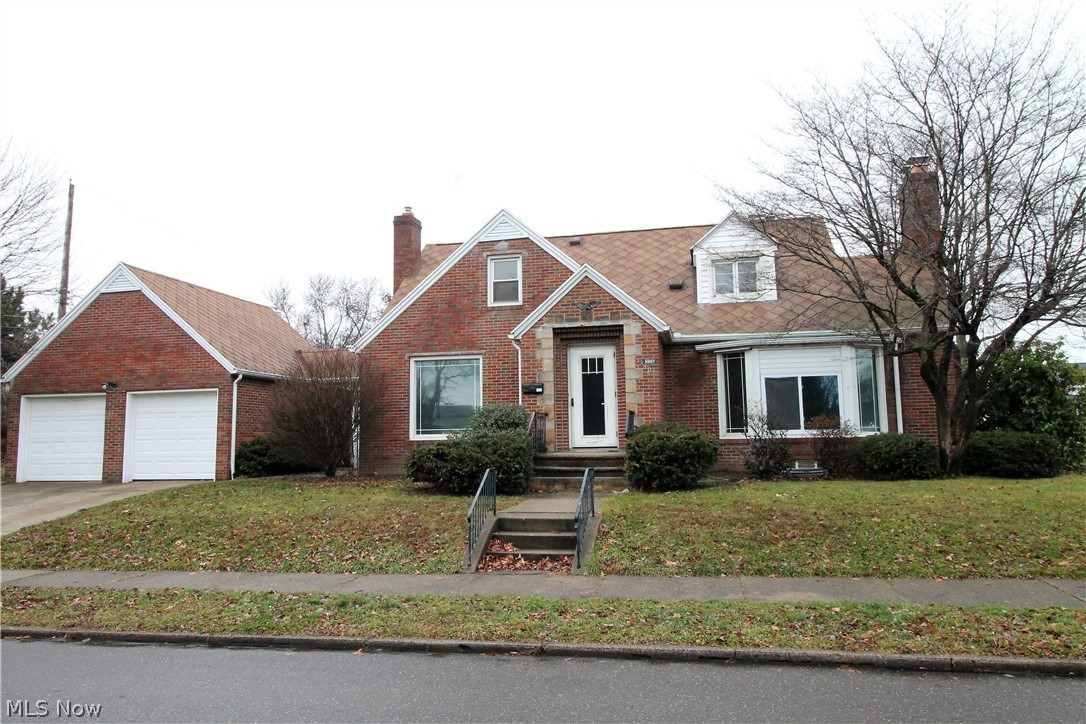 Welcome to this large, move in ready, beautiful corner lot with mature landscape, brick Tudor home offering three bedrooms, three full baths. Come on in from the front porch to the large living room which offers a wood burning fireplace with mantle, and large windows to let the natural light to shine through, new carpet throughout the home and formal dining room. The bright kitchen has new luxury vinyl tile flooring, recently painted, new countertops, abundant of cabinets, pantry, eat in area or coffee bar area. There is a first-floor bedroom with full bath to finish the main level. Upstairs you will find two large bedrooms with full bath and new vanity. The basement is finished with new carpet, wood burning fireplace, third full bathroom, plenty of room to entertain or work out area, etc. There is a breezeway to the two-car garage. Some updates include newer air conditioner and furnace, roof just serviced. Precious memories begin right here!