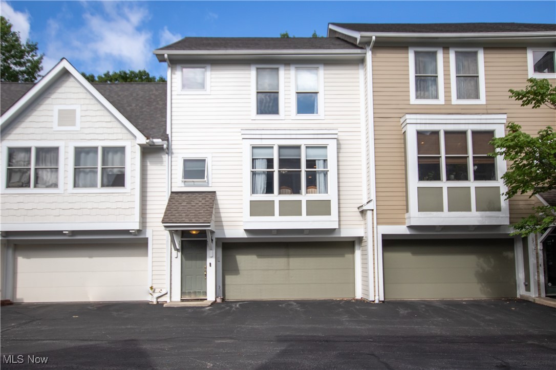Great opportunity to live in a newer, spacious townhome just minutes from University Circle, Cleveland Clinic, University Hospitals, Case Western Reserve, John Carroll University, and more! The main floor features an open-concept eat-in kitchen with granite counters, a large island with seating and storage, hardwood floors, dining area, living room, and a convenient half bath. High ceilings enhance the open, airy feel throughout. Upstairs, both bedrooms are full suites with private baths. The primary includes a vaulted ceiling and glamour bath, while the second bedroom offers its own full bath and easy access to the laundry area for convenience. Step out onto the balcony to relax and enjoy the view. Additional highlights include a 2-car attached garage and an exceptional community setting!