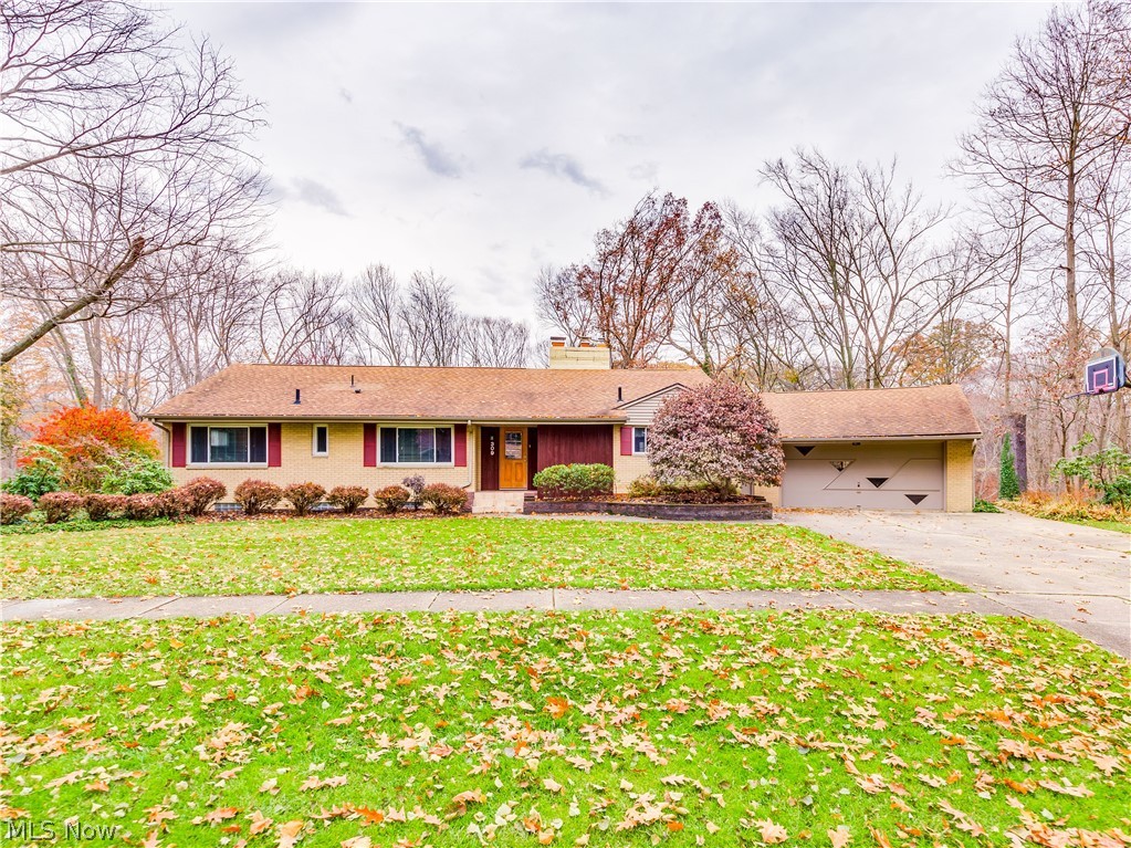 Beauty! Gorgeous Brick Ranch with .68 acres on a Cul De Sac!! What a view!! Over looking a spectacular ravine with a bubbling creek and view of Fairlawn Country Club Golf Coarse. Large kitchen with hardwood floors, corian counter tops and loads of cabinetry. Living room with fireplace and wall to wall windows panoramic view. Master suite has updated bathroom and main bathroom. Granite counter tops. Newer carpet throughout except lower level. Fully finished walk out lower level includes living room with full bath, fireplace, and 2nd kitchen. The 11 X 15 lower level room can be used as a 4th bedroom. Hot tub!! Additional 200 amp service, furnace and air approximately 2014. H2O tank 2014.