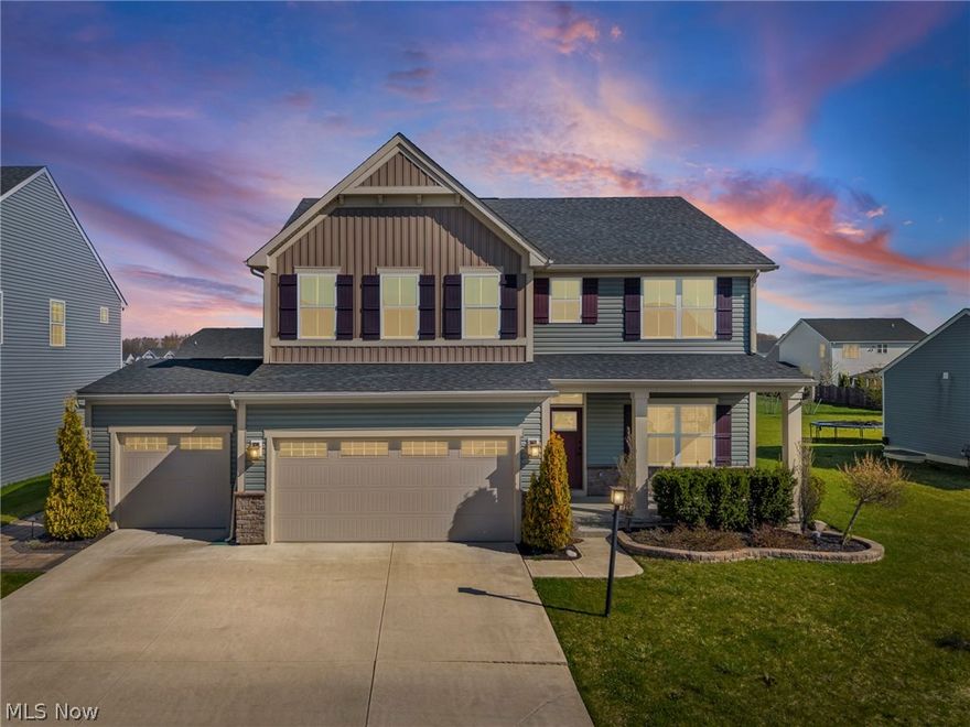 Welcome to this beautifully maintained, modern home in the desirable Mill Ridge community of North Ridgeville! Built just 6 years ago, this move-in-ready property offers the perfect blend of space, style, and convenience—without the wait of new construction. Featuring 4 spacious bedrooms and 2.5 baths, this home includes an open-concept layout ideal for today’s lifestyle. The family room flows seamlessly into the dining area and kitchen, creating a perfect space for entertaining. A dedicated office provides flexibility for remote work or study. Upstairs, you’ll find generously sized bedrooms, three of them with walk-in closets. The primary suite stands out with two walk-in closets (his & hers) and a well-appointed en-suite bath. Both full bathrooms include double vanities for added comfort and functionality. Additional highlights include a 3-car garage, a full unfinished basement with a 3-piece rough-in for a future bathroom, and an automated sprinkler system. Step outside to enjoy the impressive 43x21 stone patio complete with a fireplace—perfect for relaxing or hosting gatherings. This home offers numerous upgrades and thoughtful features throughout. For more information or to schedule a private showing, please reach out today!