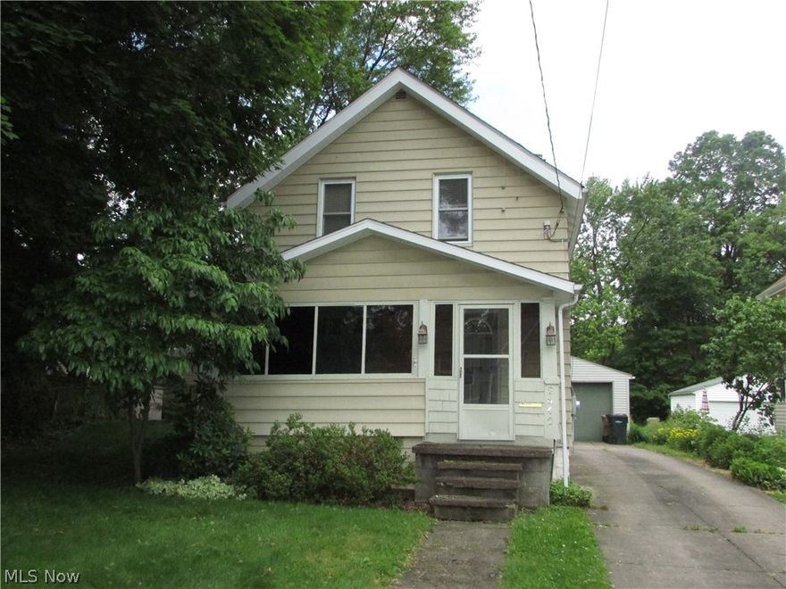 An affordable Cuyahoga Falls colonial with 3 bedrooms and a massive 28'x20' garage!  There are natural hardwood floors throughout.  The kitchen has had some updates.  There is a large yard with a large deck.  The living room opens to a covered porch.  There have been many updates including vinyl windows, furnace, and air.  There is a full basement, formal dining room, large bathroom, and so much more