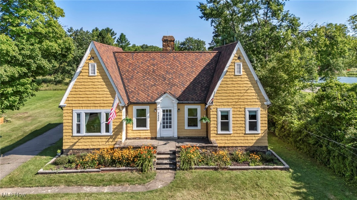 Welcome home to a rare and versatile property located in the heart of Chesterland, offering the perfect combination of space, functionality, and investment potential. Set on a generous lot with two parcel numbers, this unique home offers endless possibilities — whether you're seeking a spacious private residence, a multi-use setup, or a property to expand and grow over time. Inside, you'll find a thoughtfully designed layout featuring multiple living areas, generously sized bedrooms, and beautiful hardwood flooring that adds warmth and character throughout. The property also features a detached 3-car garage, offering abundant space for vehicles, storage, hobbies, or a workshop. Major updates include a New Roof installed in 2019 with 50-year shingles, new windows throughout in 2023, and a Rhino Shield exterior coating with a warranty, providing long-term protection, energy efficiency, and low-maintenance curb appeal. With a flexible floor plan ideal for multi-generational living, home-based work, or future customization, this home adapts easily to a variety of lifestyles. Enjoy the privacy and space of suburban living while being just minutes from shopping, dining, parks, and the award-winning West Geauga School District. Whether you're ready to personalize your next home or invest in a property with exceptional potential, this home is a rare opportunity in one of Chesterland’s most desirable areas. Schedule your private showing today, this won't last!