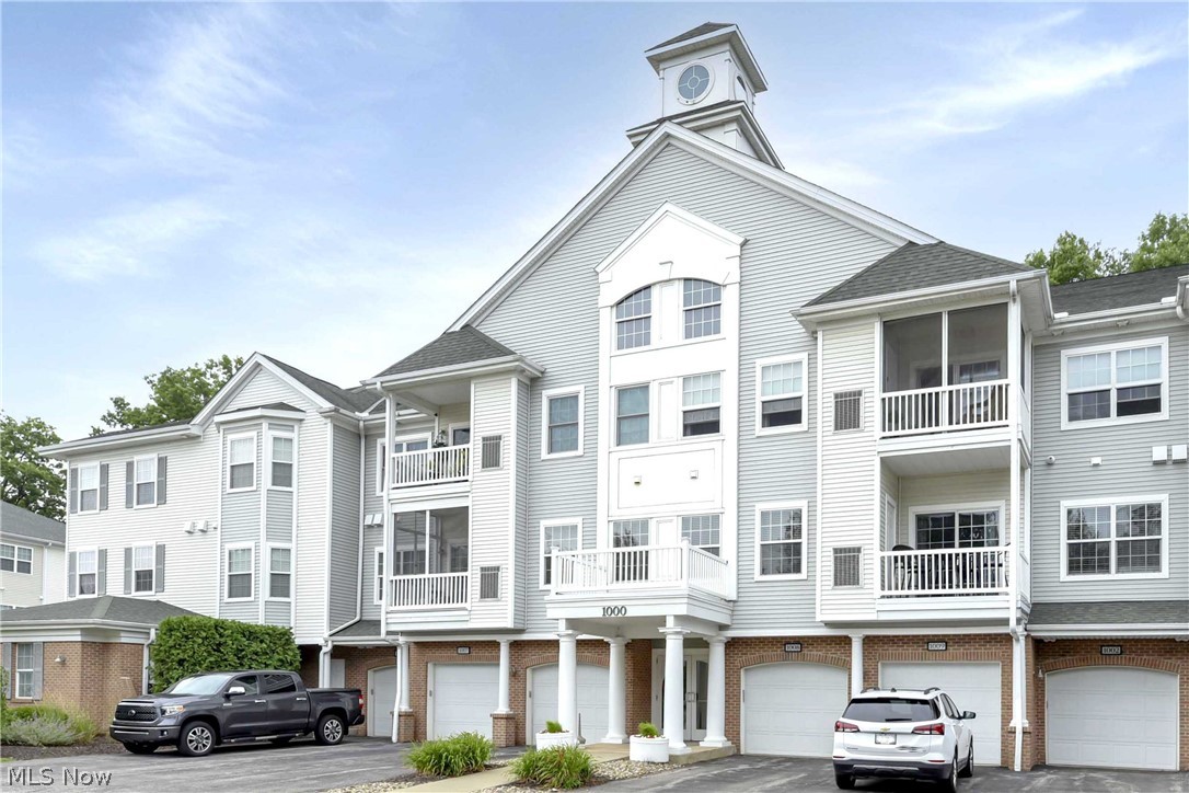 Prepare to be Moved!...into this spacious 2BR Aqua Marine condo with over 1200 sq ft of carefree, secure living. The foyer leads into the living room where warm & cozy tones and sliding balcony door keep this space light and airy. The open floor plan living and dining is perfect for entertaining. The spacious kitchen with classic cabinets and ample counter space allow plenty of space to whip up your favorite meals. Many upgrades included in this build with flooring, trim work, granite countertops and kitchen cabinets. In-suite laundry room is right off the kitchen and features extra storage. Large Master suite with large closet and full, newly painted bathroom. Second bedroom shares the second full hall bath. Elevator access to second floor. Enjoy sweeping views from the retractable screened in porch with composite decking. You’ll find an extra, large storage locker next to the attached 1 car garage. Amenities include access to workout room, pool and tennis with views of the beautif