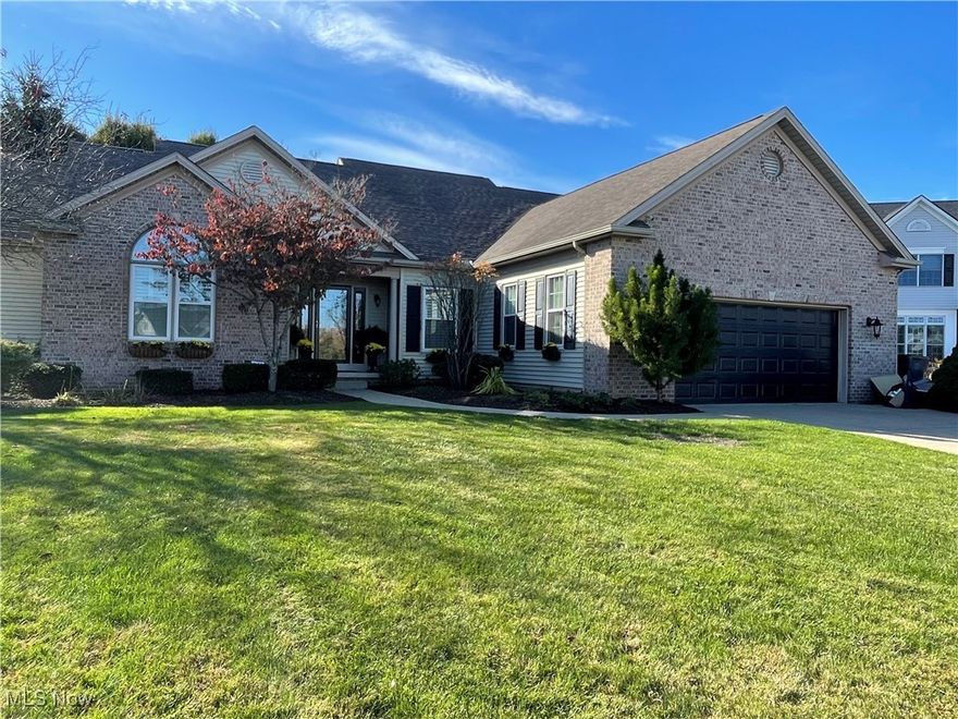 Jackson Township – Jackson Local Schools. Move-in ready ranch located on a quiet cul-de-sac in the desirable Jackson Local School District. This beautiful brick and vinyl-sided home offers 5 bedrooms and 4 full baths with spacious, modern living throughout. An open foyer leads to a large great room with vaulted ceiling and a gas fireplace accented by a custom mantel. The light-filled eat-in kitchen includes maple honey cabinetry, GE appliances with gas stove, recessed lighting, and an extended countertop perfect for bar seating. A convenient man-door opens to the cement patio—ideal for outdoor entertaining. The owner’s suite features a generous walk-in closet and private bath with double sinks, Jacuzzi tub, and separate walk-in shower. A first-floor laundry room with sink adds everyday convenience. The fully finished lower level provides even more living space with all-new luxury vinyl plank flooring, two additional bedrooms, a full bath with porcelain-tiled walk-in shower, an office or bonus room, extra storage, and an egress window allowing natural light. Combining comfort, quality, and functionality, this move-in ready Jackson Township home.