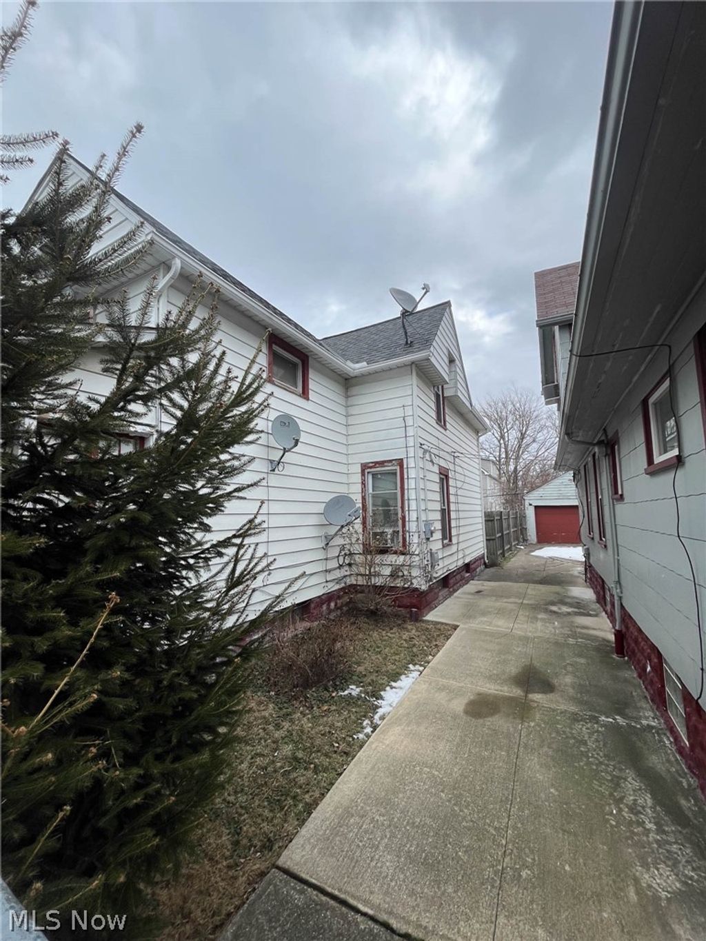 Photo of 465 E 142nd Street, Cleveland, OH 44110 (MLS # 5200405)