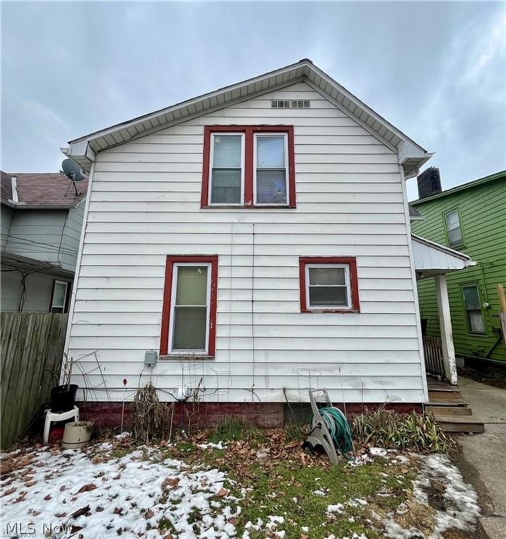 Photo of 465 E 142nd Street, Cleveland, OH 44110 (MLS # 5200405)