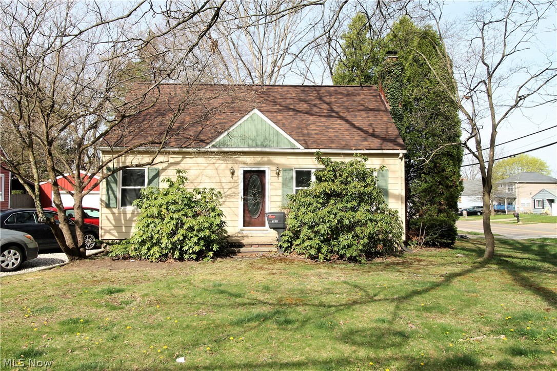 Welcome to this charming three bedroom, one and half bath, simplicity in dormered cape. This home has an enclosed breezeway to enjoy, and is attached from the home to the two car garage. The living room has a fireplace, neutral carpet and is open to the eat in kitchen which offers an abundant of cabinets. Lots of windows to let the natural light to shine through in this beautiful home. There are two bedrooms and a bright full bathroom all on the main level. The second level is another bedroom or could easily be an office, rec room etc. The lower level is partially finished offering more room to entertain or just enjoying, half bath and laundry area. So many precious memories begin right here.