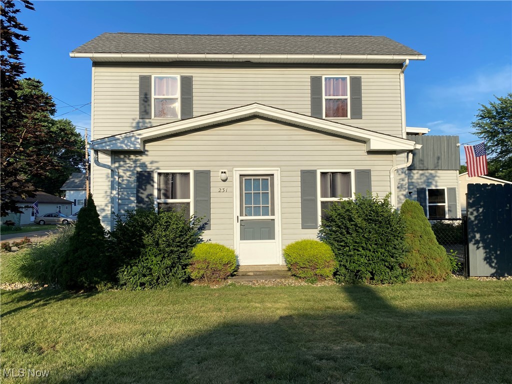 This one-of-a-kind property in New Phila is being offered for sale for the first time in almost 50 years! This home is ideal for multigenerational living or an easy conversion to an up/down duplex. Located on a fenced corner lot with peaceful nature views at the edge of town, the property perfectly blends privacy and practicality. The oversized two-car garage includes heat, a sink, floor drain, and ample lighting. Additional features outside include a workshop shed with power and electric heat, a lawncare shed with lighting, and off-street parking for 7 vehicles including the garage. This home is ready for anything with the included Dual Fuel Whole Home Generator, as well as a One-Time Transferrable Warranty on the roof. Inside, the main level includes a kitchen, living room, laundry closet, and main floor bedroom & bathroom. The bathroom features a stall shower, great counter space, and a brand new LED vanity mirror. Upstairs offers two bedrooms, a full bath with large shower, and an open-concept kitchen/living/dining area with two sliding doors leading to the grand upper deck. Half of the deck is open for full sun, and the other half is covered with gas grill hookups and an outdoor TV mount, the perfect space for summertime entertaining! Accommodations have been made for your four-legged friends a well! A large dog door installed upstairs leads your pets safely to the backyard, which also features an outdoor dog kennel and vinyl coated chain link fence surrounding. Gardeners will love the sunny southern facing back yard! Call today to schedule your private showing!