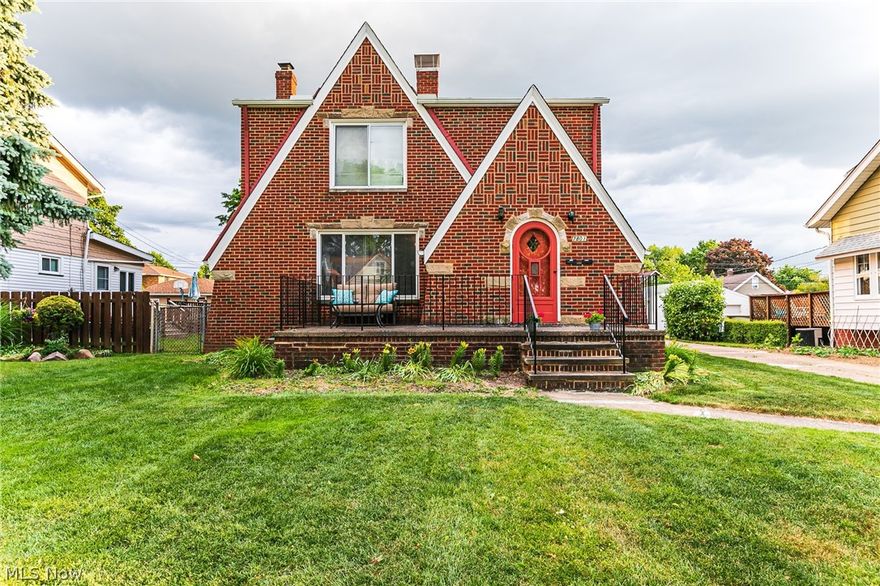 Charming Brick Tudor Double with Excellent tenants is an Investors dream! Each Unit Has 2 Bedrooms + a Bonus Room (Each unit has an Enclosed & Heated Rear Porch). The home features beautiful hardwood floors and a decorative fireplace. The dining room has built-in leaded glass cabinets and the kitchen features rich wood cabinets. The basement has been freshly painted and has 2 brand new furnaces. Other upgrades include: Roof 10/12 yrs old, windows were replaced 15 yrs ago, central air, service panel  & electrical box in lower unit. This home is completed by a 2 Car Detached Garage and is Situated on a Deep, Park-like Lot, with Fruit Trees and a beautifully maintained yard! Please contact me for more details!