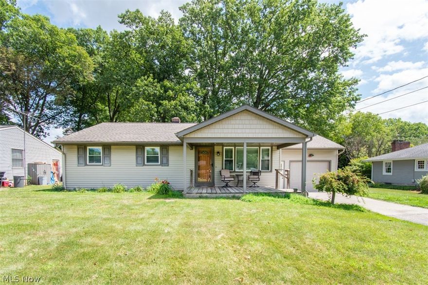 Austintown Schools, totally UPDATED  ranch home on quiet street with great front and back porch and large lot .  Spacious living room with great wood floors and eat in kitchen with newer cabinets, stainless steel appliances , granite counters and porcelain tile floors. Full bath tiled and updated. The master bedroom which was converted from a second bedroom to make this one extra large room .  Newer roof, vinyl windows, siding, furnace , AC . All appliances stay.