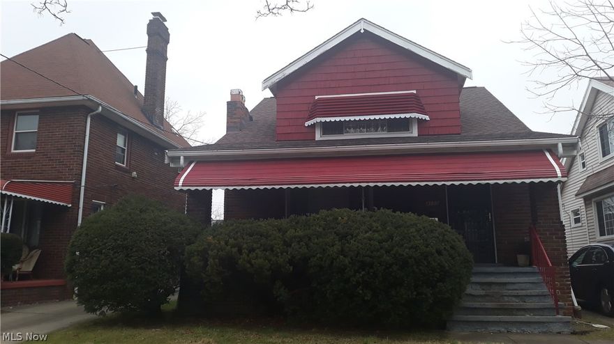 All brick house located in the Lee/Miles area; city of Cleveland.  Hardwood floors through out; spacious living room and dining room.  Seller expanded 1st floor bedroom and added a first floor full bathroom.  There is a utility hook up located in the kitchen for a stack-able washer and dryer.  Refrigerator, stove, and dish washer will stay.  2 car detached garage in good condition.  House is steam heated.