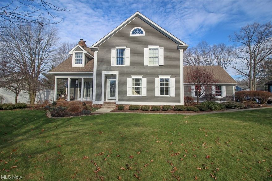 Welcome to your new home in Burgess Manor! This home has custom features that you will adore. As you enter through the breathtaking lead glass door, your eyes are drawn to the remarkable staircase in the foyer. The formal living room and dining room lead to a grand eat-in kitchen with granite countertops, cherry harvest dura supreme soft-close cabinets, and drawers. The kitchen overlooks the wood deck and spacious backyard. Adjacent to the kitchen is the first-floor laundry with a built-in coat rack and bench, as well as a large double under-counter sink. The first floor also includes a half bath, pantry, and storage closet, with convenient access to the garage through a second front door.

On the other side of the kitchen, you'll find a den/office area with a vaulted ceiling and sliding glass doors leading to the wood deck and backyard. There's also a cozy family room with a brick gas fireplace and custom built-ins, along with another sliding glass door leading to the front porch.

Upstairs, a spacious linen closet is conveniently located for all bedroom uses. Two bedrooms, one with easy access to the catwalk above the front door, shared jack-and-jill bathroom with pocket doors, dual sinks, and a remodeled tub/shower. The second bedroom features a walk-in closet with an access door.

The primary suite welcomes you with vaulted/tray ceilings, a small reading nook, a walk-in closet, and a large master bathroom with a skylight, dual sinks with granite countertops, a soaking tub, and a spacious walk-in shower with a seated bench.

The basement provides plenty of storage space and has storage shelves on castors for ease and organization.