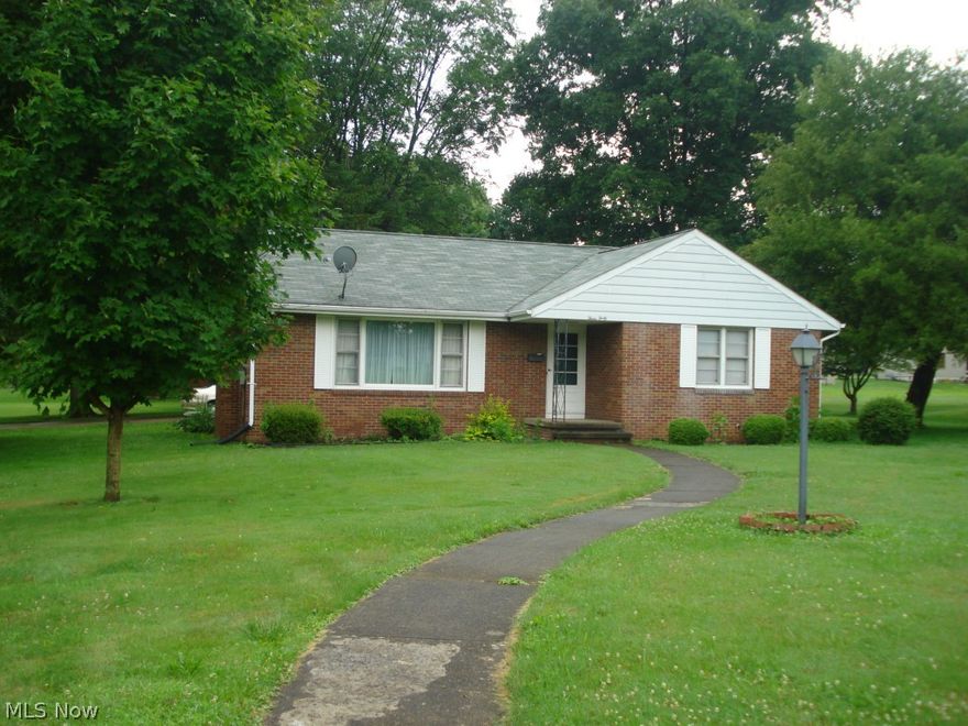 Lovely 2 br brick ranch, featuring newer furnace, A/ C, windows,and roof.  Large rec room in basement has long bar, 3 bar stools, and shop next to 3/4 bath.  There are 5 parcels with this irregular lot.