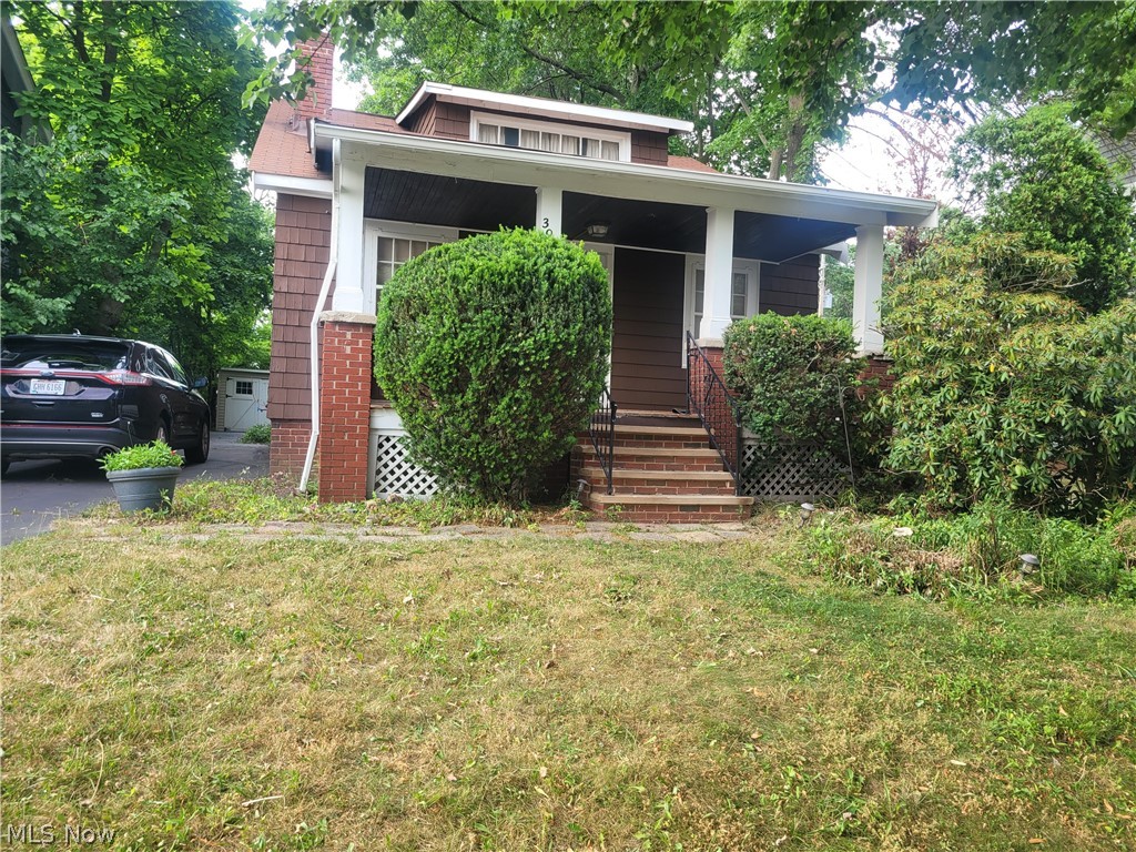 Wonderful Opportunity in Highly Desirable Cleveland Hts.*Listed as "one of the best places to live in Ohio" by Niche rating service*offers a perfect mix of Urban and Suburban living* Peaceful Tree lined Street Close to Freeways and all the amenities you could want*surrounded by Parks for outdoor Adventures*RANCH - Convenient One Floor living* Amazing RICH Wood Trim & doors adds warmth and Beauty throughout your new home*Dining at its finest - Incredible, solid Wood, built-in Shelving with Stunning Lead Glass doors and Storage bench for everything you need*Decorative fireplace in living room adds charm*Major ticket items are Newer - Newer furnace less than 3 years old and made ready to add Central Air Conditioning*H2O Tank 2022 and Roof is less than 15 years old*LOW utility Bills - gas and electric are budgeted at $116 per month*PRIVATE Backyard is perfect for outdoor entertaining or come and relax on your Large covered front porch and watch the world go by*Full DRY basement is wonderful storage or can be finished to add additional living area*Oversized garage*All appliances Stay*LOCATION - Great Nightlife, Restaurants, shopping, coffee shops and more! Cleveland Hts. Has over 135 acres of beautiful parkland and a State-of-the art recreational facility with Olympic size, year round ice rink and roller derby track*Choose from 5 city parks*Easy commute to Downtown Cleveland, less than 7 miles, with incredible ARTS, Beaches and Professional Sports* Call today for a private showing.