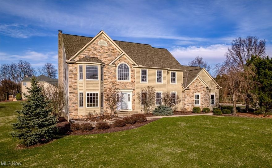 Fabulous North Solon property in Horseshoe Farms, a unique community of only 20 homes. Steps from the Metroparks with scenic walking and biking trails, bridle path, multiple picnic areas, and more! This lovely home sits back on a 1+ acre lot that will soon be in full bloom with lilacs, hibiscus, perennials and other spring flowers supported by top of the line 16 zone Wi-fi controlled sprinkler system-controls located in the laundry room. Light filled foyer where you can see the full moon with views of both the living room and dining room that has a pretty tray ceiling and crown molding. The kitchen and freshly painted family room are open to each other which makes for great for entertaining. Stone WBFP with gas logs AND custom mantle in the family room enhanced by a triple wide window view. The kitchen has an abundance of cabinets and counterspace as well as a breakfast bar/island and December 2024 stainless appliances including double convection ovens, refrigerator and dishwasher. Slider from the kitchen dining area to the recently renovated deck. Also found on the first floor, is a home office and large laundry room with cabinets, washtub and a window. Upstairs there are four spacious bedrooms including the vaulted primary suite that has an amazing 12 x 10 walk in closet and attached 350 square foot storage room off the closet that has a cathedral ceiling, is insulated, has electricity and could easily be finished. Primary bathroom has a vaulted ceiling, skylight, double sink vanity, separate shower and whirlpool tub. One of the bedrooms has both ensuite and hallway access. Roof is 11 years old with a 50 yr shingle warranty. Cedar siding replaced in 2019. Hot water tank (2024) Fully painted basement (2025) Carpeting in primary bedroom, staircase and landing (2024) One yr Home warranty. Award winning Solon School District, Solon Recreation Center with indoor & outdoor pools. Perfect location to Miles Market, Pinecrest, Chagrin Falls + great nearby dining options!