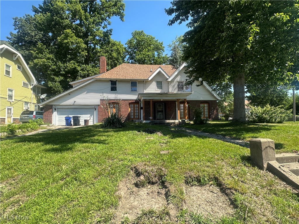Bring your vision, nice-sized bedrooms, 5 5-car garage, nice spacious yard. This house has lots of potential.