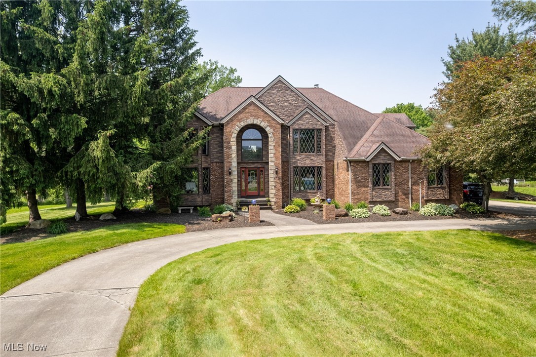 Welcome to your dream home sitting on over 7 acres in highly rated Highland schools! Bring the horses to explore the 7.26 lush acres plus the metro parks just down the road! This large home boosts over 3500 sq ft featuring 4 bedrooms 2.5 bathrooms and a main floor home office. The high vaulted ceilings and large room sizes are just some of what this home has to offer! First floor laundry, three car attached garage, four season sun room, multiple fireplaces two gas and one wood burning plus two secret playrooms just for the kids! In the back yard you will find a beautiful in ground salt water pool, and three stall horse barn waiting for your companions! Take a walk through the woods and discover the Rocky river flowing peacefully through the property. Close to all major freeways, shopping, and parks, Cannot get much better than that- Don't wait, and set up a tour today!