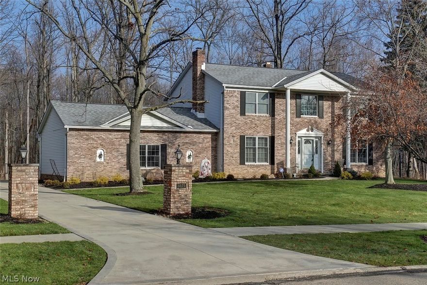 A must see colonial situated in the quiet neighborhood of Seneca Woods. This home has been meticulously maintained and updated throughout. Fantastic curb appeal offers new landscaping, stamped concrete walkway and a beautiful brick facade. Open two-story foyer with newly installed hardwood flooring throughout much of the main floor makes for a welcoming entrance. The floor plan is sure to please w/ a spacious formal living flowing into the elegant dining room. 1/2 bath on the main floor  The eat-in kitchen has been updated w/ granite countertops, mosaic tile backsplash and newer appliances. Located off the kitchen is a cozy family room w/ fireplace & wet bar. First floor laundry and access to the huge attached 3-car garage round out the first floor. The second floor features for 4 ample sized bedrooms with an in suite master bath and a full bath off the main hall. The lower level was finished in 2014 with a full bath, storage and nearly 1,000 sq ft of additional living space! Situated