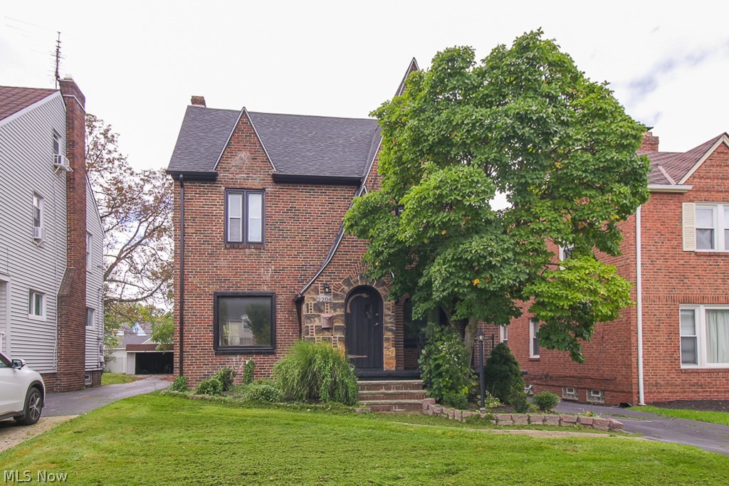 MOVE RIGHT IN!!!! 2204 Jackson Blvd is ready to be enjoyed and has so much to offer a new homeowner. This beautiful brick Tudor offers FOUR great sized bedrooms with an entire floor dedicated to the owners suite AND has an on suite bathroom as well!! Everything in this home is new, new roof, new windows, brand new tastefully updated kitchen fit for a chef! Gorgeous refinished hard wood floors, modern fixtures and tile accented entryway and fireplace. Each room flows seamlessly to the next, which allows for great gatherings. This home has the classic University Heights charm as well as the space that most people are looking for. Outside the home offers a two car garage with Tesla charger attached for all my Tesla owners!! Don't wait, start 2023 off right...let 2204 Jackson be the perfect place to call home!! A Cinch Home Warranty will also be offered with the sale of this home for your piece of mind!!!! Book your showings today
