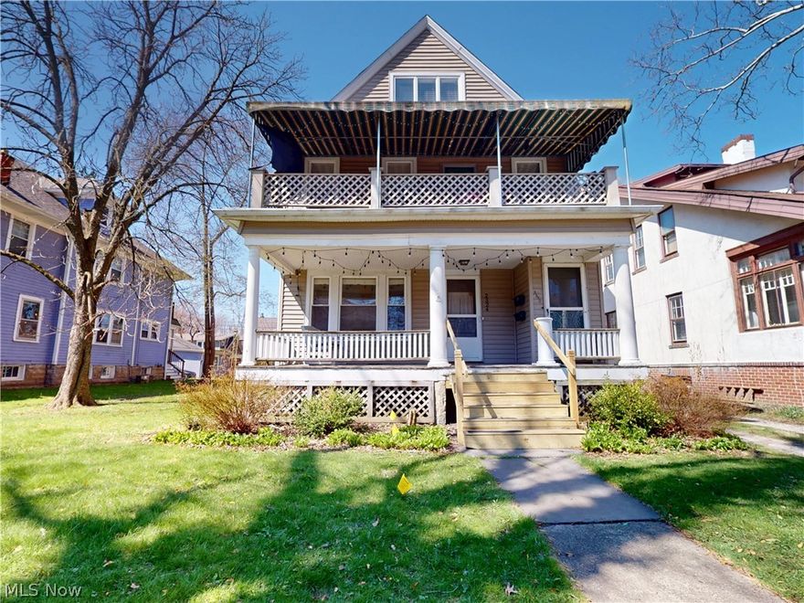 Prime Cedar Hill multi-family in a highly walkable location near Cedar Fairmount, Case Western Reserve University, and University Hospitals. Features two suites: a spacious 2nd/3rd floor unit with 3 bedrooms and 2 full baths, including updated kitchen and bath, hardwood floors, and a private staircase to a vaulted, sun-lit 3rd floor with bonus room and full bath. The 1st floor offers 2 bedrooms and 1 full bath with hardwood floors. Vinyl siding for low maintenance, 4-car garage, plus ample additional parking. Excellent opportunity for owner-occupants or investors.