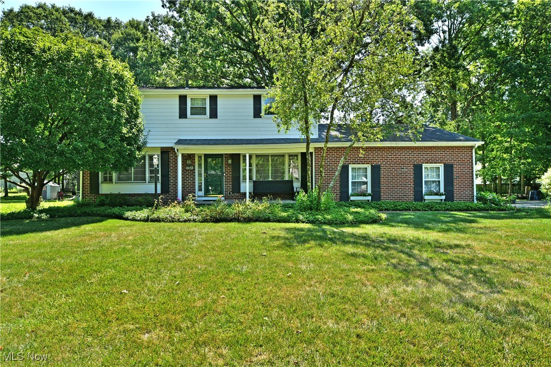Have you been on the hunt for space and style? Does this idea of warm, traditional design elements appeal to you? What about a huge yard, lined with tall trees to create a scenic, park-like setting? Get ready to toss away your checklist and open the front door to this expansive Liberty Township home! The sprawling estate instantly draws you near with its rich brick work and sprawling sidewalk that leads past the oversized 2 car attached garage and covered front porch. Inside, a robust foyer wows as the grand staircase rises from your feet. Hardwood flooring spills away into the adjacent formal dining room where decorative lighting joins a row of windows. Across the short hall, a decadent living room showcases its ornate fireplace and casual corner dining space that overlooks the backyard. A colorful half bath bridges a remarkable kitchen with its oversized footprint and extra features such as instant hot and warming drawer. The massive island is cabinet-lined as it includes an inset range and prep sink. Tiled flooring flows out beneath the adjoining dining space, awash in the soft natural light from the overhead skylight. Adding to the illumination, the window lined rear wall cascades sunlight across the glass tile backsplash. Completing the floor, a wood trimmed family room offers lattice windows and a prominent brick fireplace. Upstairs, a breathtaking full bath found at the landing showcases an arched window and a soaking tub. Four generous bedrooms await, including an oversized master suite with a newly remodeled (2021) en-suite bath featuring a custom tile shower. Downstairs, the finished basement offers a large rec room, abundant storage, and a cozy laundry area. Updates include: air conditioner 2023, oven 2023, electric box 2015, upstairs windows 2008, roof 2006, and so much more! Plus a one-year home warranty!