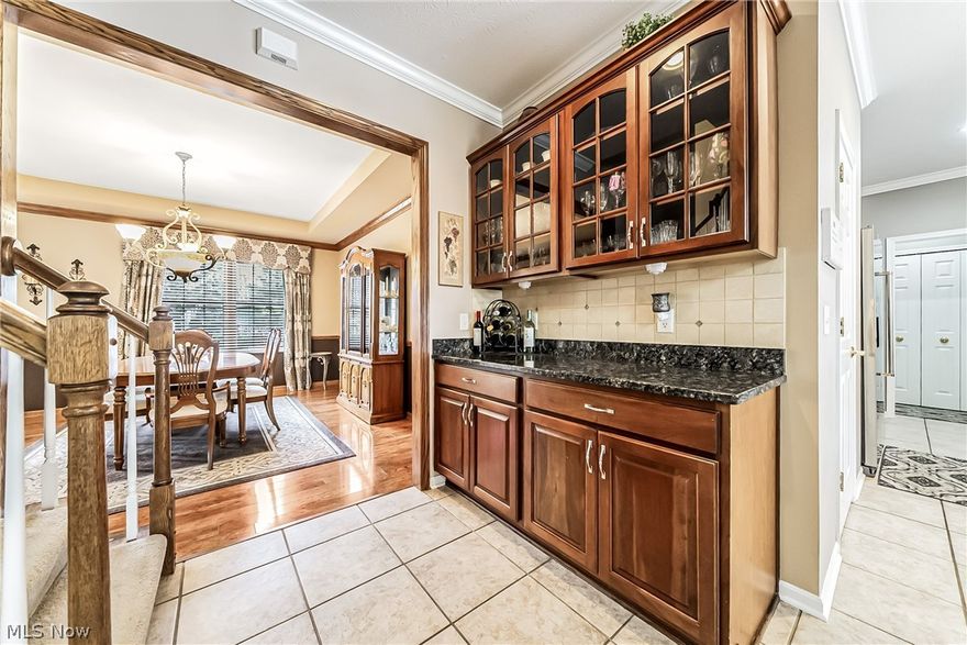 Why on earth would you settle for less when you could have MORE?  KYLEMORE, that is!! That’s right:  Nestled in a cozy corridor of Strongsville’s distinguished and highly-coveted Waterford Crossing, this five-bathroom, four-bedroom colossal colonial is arguably the flagship house in the community.  This 6500-square foot, 2001 Ream build boasts a kaleidoscope of fabulous and fetching features.  As you enter, you’ll marvel at the grand staircase, the vaulted ceilings, and all the natural light that beams through all the wondrous windows.  You’ll adore the dynamic dining room, the free-flowing family room, and the splendid sunroom (with the Brazilian cherry floors underfoot).  The vast kitchen is replete with custom cabinetry, gorgeous granite countertops, an inviting island, amazing appliances, and a double-decker oven. Mmm.  How delicious.  (Don’t forget about that first-floor laundry room and half-bath, either!)  Upstairs, you’ll find those four magnificent bedrooms and three full, gorgeous bathrooms.  Below deck, you’ll find a massive, finished basement with a full bath, a bar, and three extra rooms that could be used for offices, storage, or anything else you can imagine.  Out back, you’ll find a perfect stone patio and plenty of green space to roam.  Add in a three-car garage, TWO COMPLETE HVAC units (updated within the past few years), a new roof (2023), and a development that showcases a private swimming pool, community clubhouse, playground, fishing ponds, an elementary school, and so much more, and there’s only one thing to ask:  Isn’t it time you treated yourself to “more”?