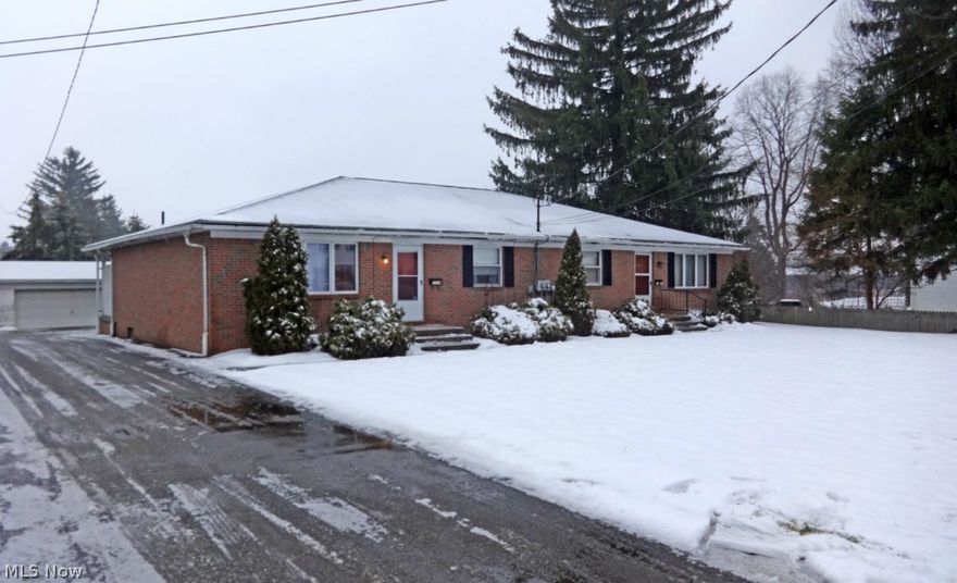 Adjoining Meadowlake Golf Club in back.  One owner duplex.  Estate property.  Blacktop drive refinished 2013.  New roof 2011.  Detached block garages.  Selling with adjoining duplex (1111-1113 37th St NE, Canton, Ohio) MLS #3677252. Share a common drive.  Very well cared for, custom built by owner.  Central air in unit 1123.